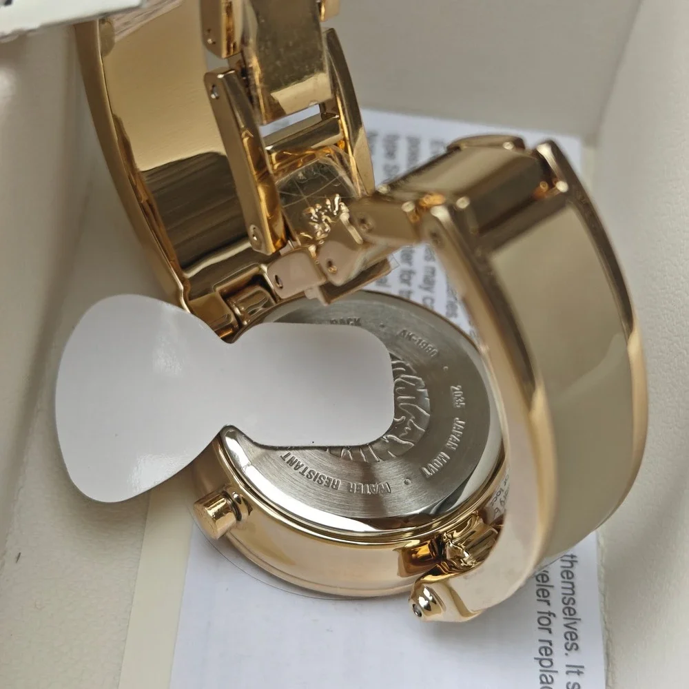 Anne Klein Women Gold Tan Enamel Bangle Watch Genuine Diamond AK-1980TMGB NEW